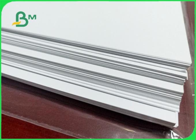 Size 600mm smoothness no spots 60gsm exercise book paper in reels / reams