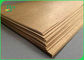 Brązowy papier pakowy 280 - 300 g/m2 do folderów 56 x 100 cm Dobra sztywność