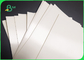 Biały papier na lunch powlekany PE o grubości 0,53 mm do smażonej żywności 65 x 100 cm, odporny na tłuszcz