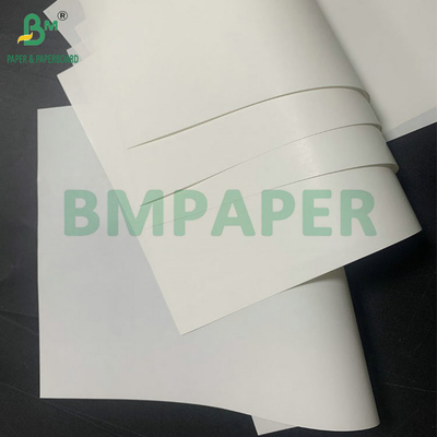 Papier o wysokiej odporności na mokro, biały, błyszczący, o masie 65 gm, do wytwarzania etykiet do butelek piwa, o wymiarach 65 x 95 cm