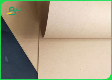 250 / 300 / 300gm Dobra wytrzymałość powierzchni Glossy Kraft Paper Roll For Packing